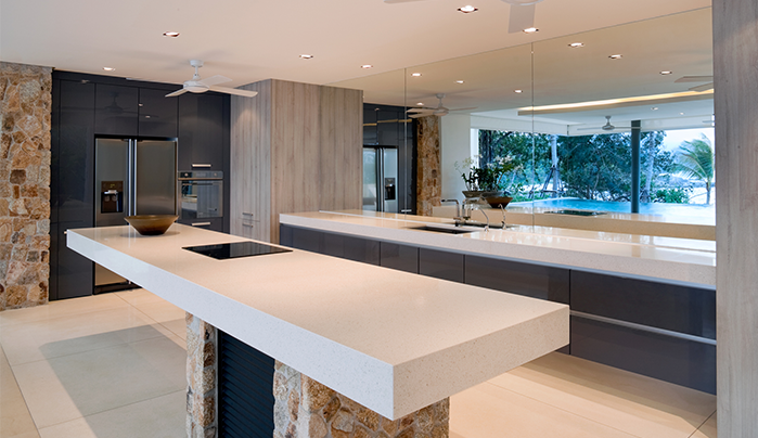 Open kitchen with laminate cabinetry- CenturyPly